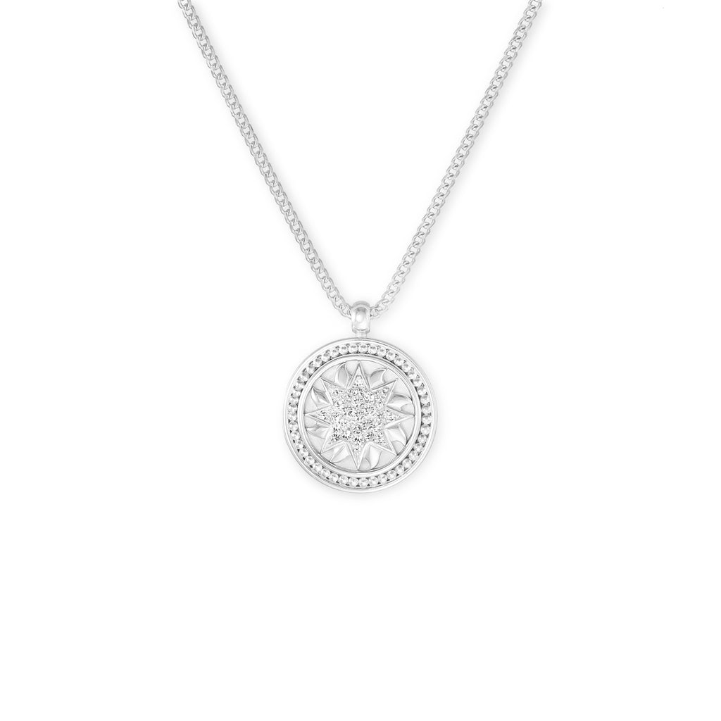 18 white gold and diamond sun pendant