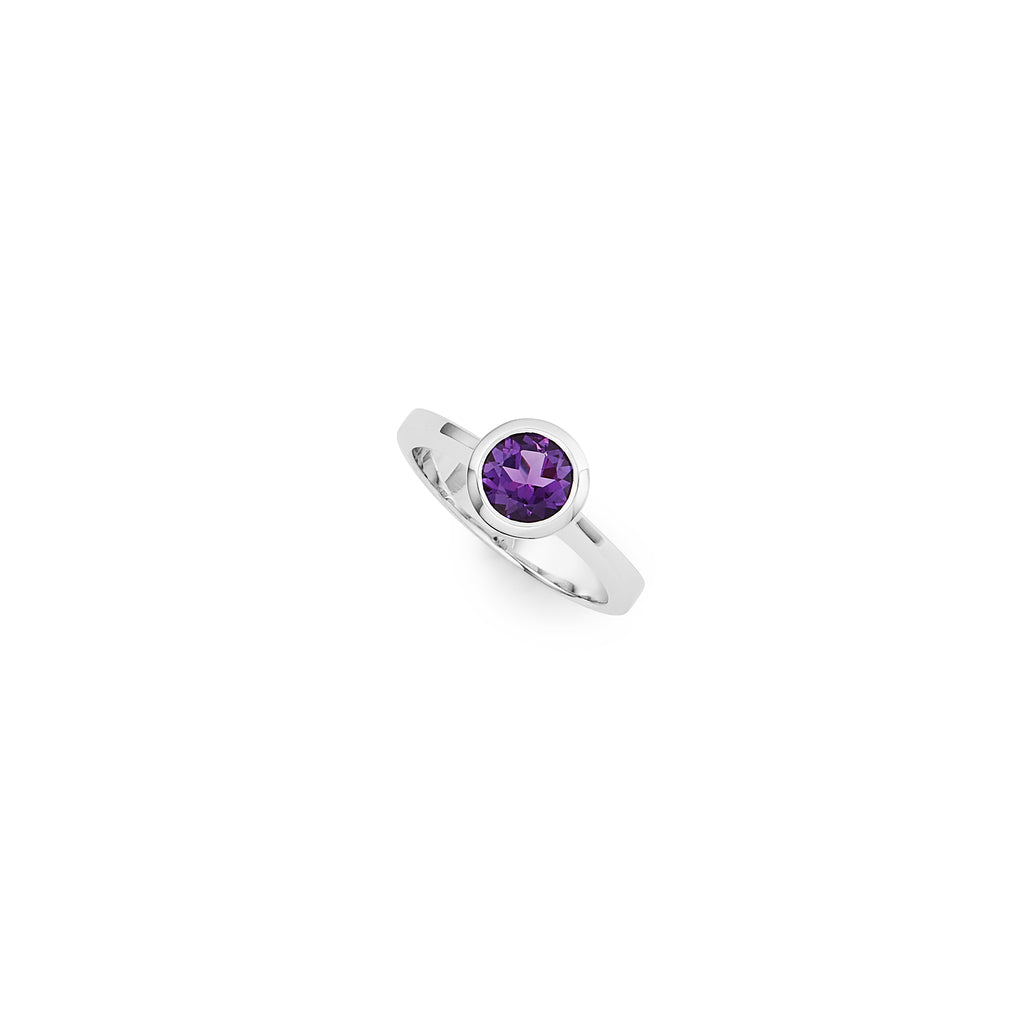 Silver and amethyst solitaire ring